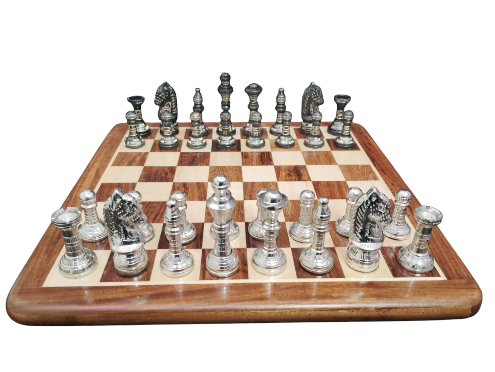 Elegant 2.75-inch Brass Staunton-style chess pieces with premium craftsmanship, paired with a soft velvet pouch for safe storage, offering elegance and durability